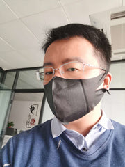 Man wearing black 3-ply facemask